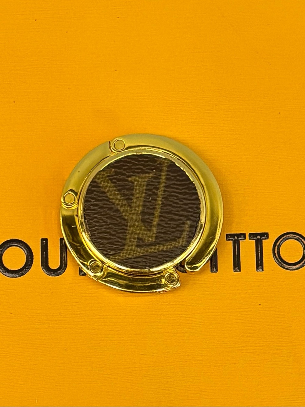 Louis Vuitton Glossy Handbag
Bag Purse
Hanger Hook Holder, Gold Tone LV